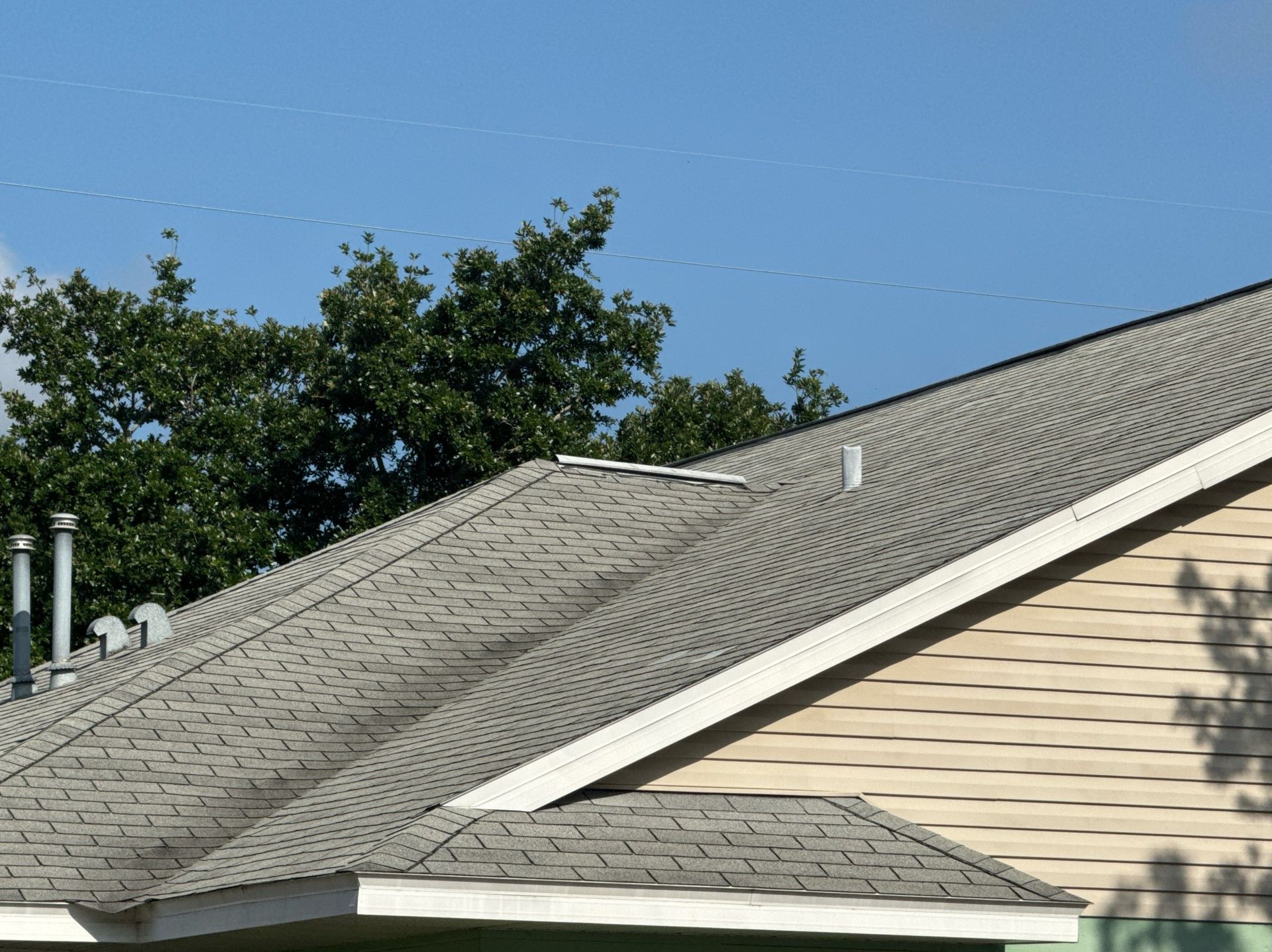 Close view of a completed architectural shingle roof